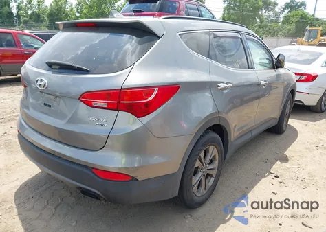 2015 Hyundai Santa Fe Sport from USA, damaged, VIN 5XYZUDLB5FG274737